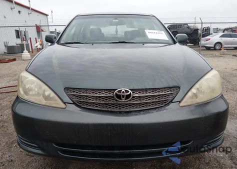 2003 Toyota Camry Le z USA, uszkodzony, nr VIN 4T1BE32K23U773023